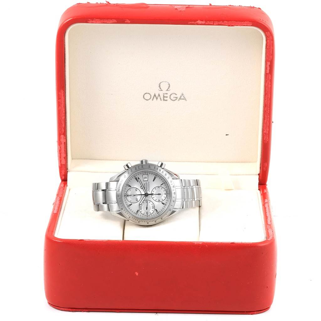 The Omega Speedmaster 3211.30.00 Men
s Stainless Steel Silver Dial 3211.30.00 Men
s Stainless Steel Silver Dial watch is shown in its original red box, with a frontal view of the watch and bracelet visible.