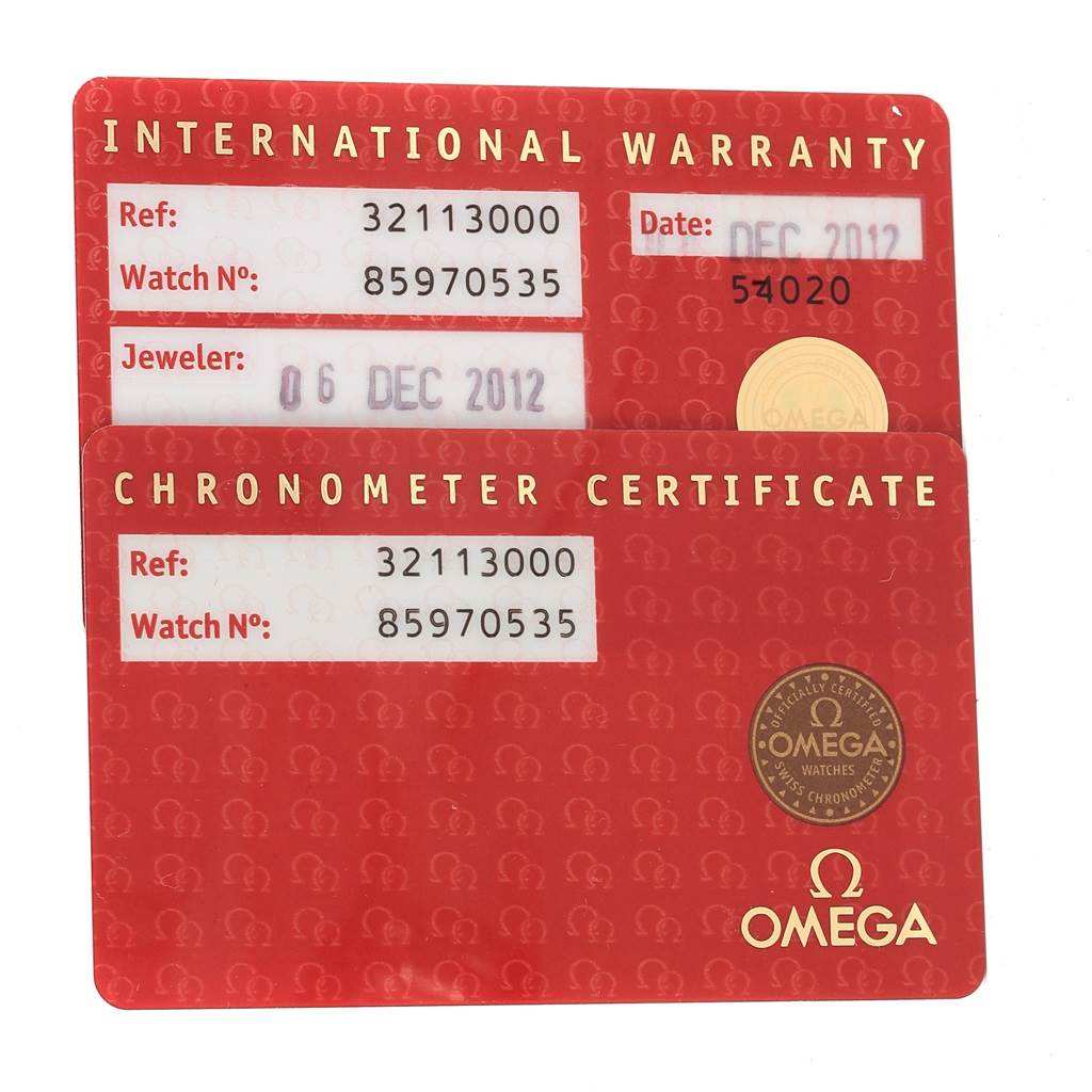 The image shows the international warranty and chronometer certificate cards for an Omega Speedmaster 3211.30.00 Men
s Stainless Steel Silver Dial 3211.30.00 Men
s Stainless Steel Silver Dial watch.