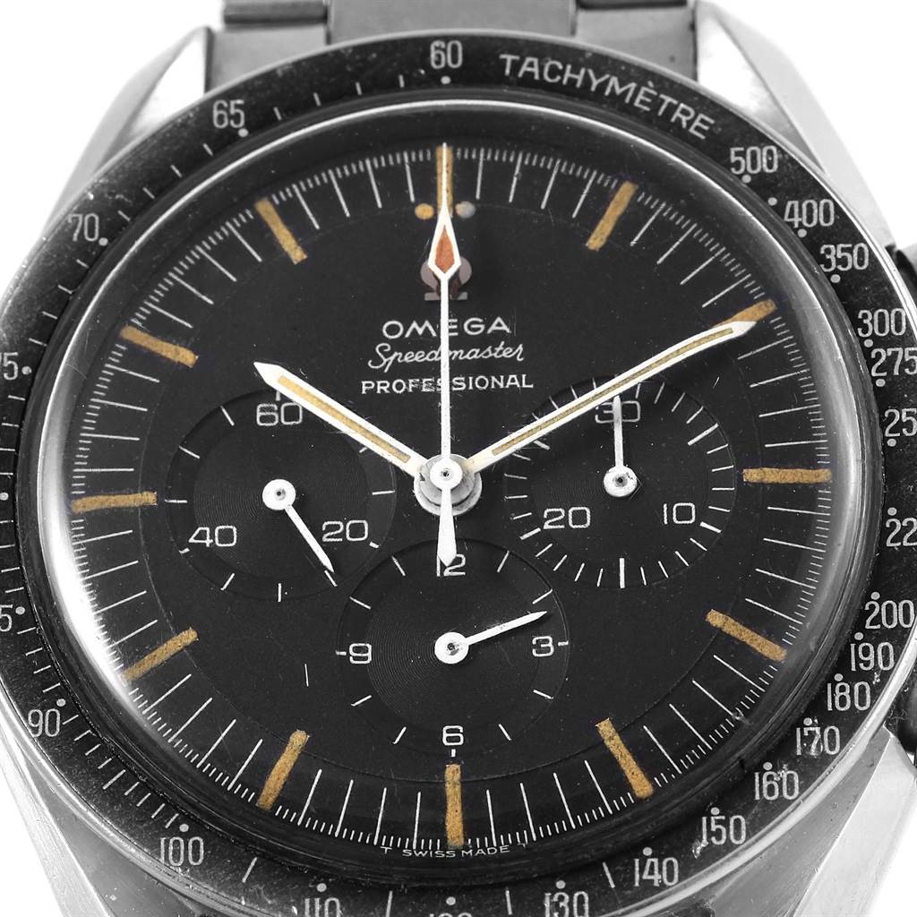 This image shows a top-down view of the Omega Speedmaster 105.012-64 Men's Stainless Steel Black Dial 105.012-64 Men's Stainless Steel Black Dial Professional, highlighting the dial, subdials, and tachymeter bezel.