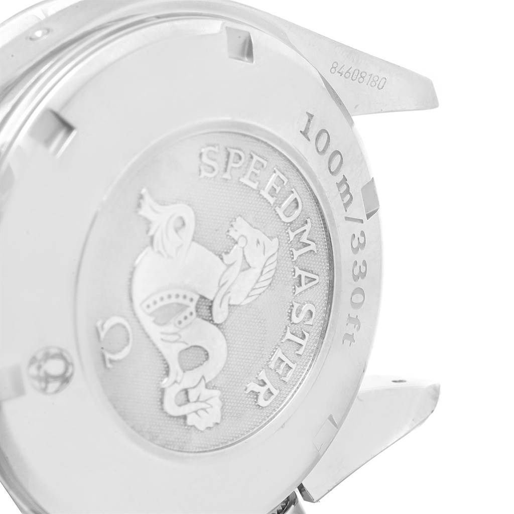 The image shows the back casing of an Omega Speedmaster 3220.50.00 Men
s Stainless Steel Black Dial 3220.50.00 Men
s Stainless Steel Black Dial watch at a slight angle, highlighting its engraved details.