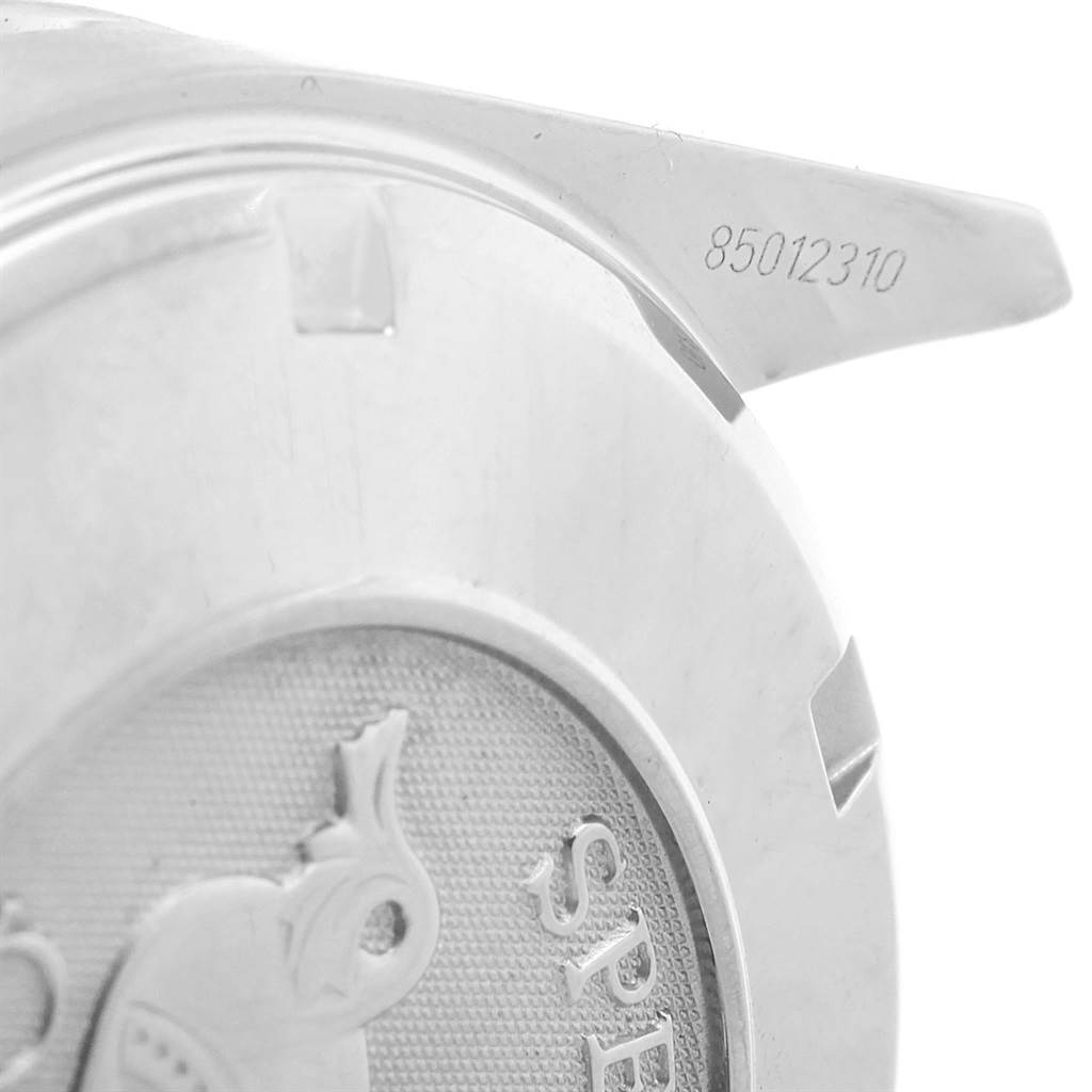 The image displays the case back and part of the lugs of an Omega Speedmaster 3210.50.00 Men
s Stainless Steel Black Dial 3210.50.00 Men
s Stainless Steel Black Dial watch, including a serial number on the lug.