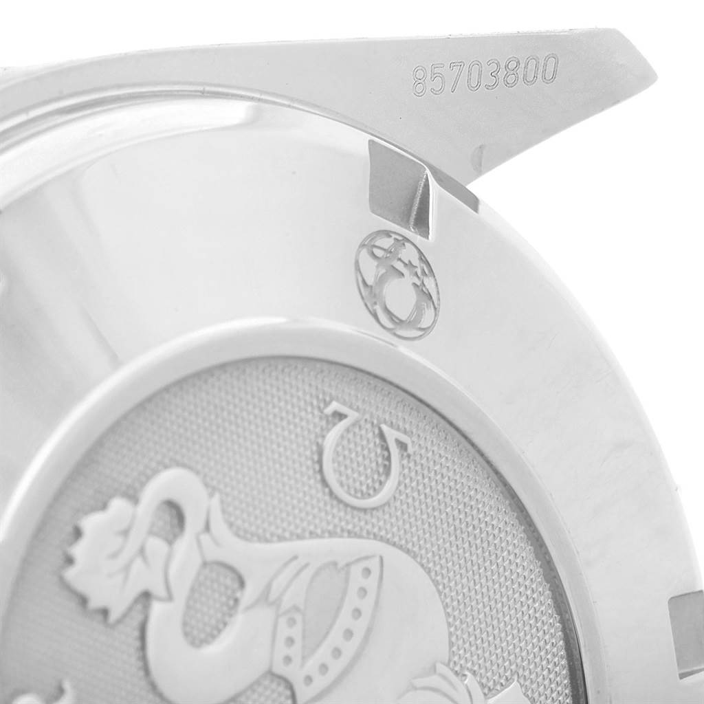 This image shows the back casing of an Omega Speedmaster 3210.50.00 Men
s Stainless Steel Black Dial 3210.50.00 Men
s Stainless Steel Black Dial watch, highlighting the serial number and logo.