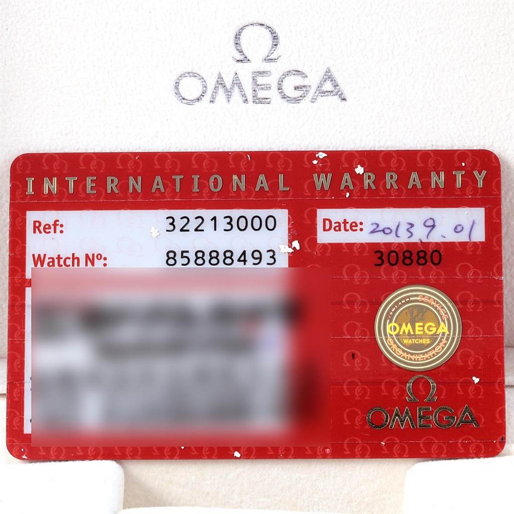This image shows the international warranty card for an Omega Speedmaster 3221.30.00 Men's Stainless Steel Silver Dial 3221.30.00 Men's Stainless Steel Silver Dial watch, featuring the brand name and warranty details.