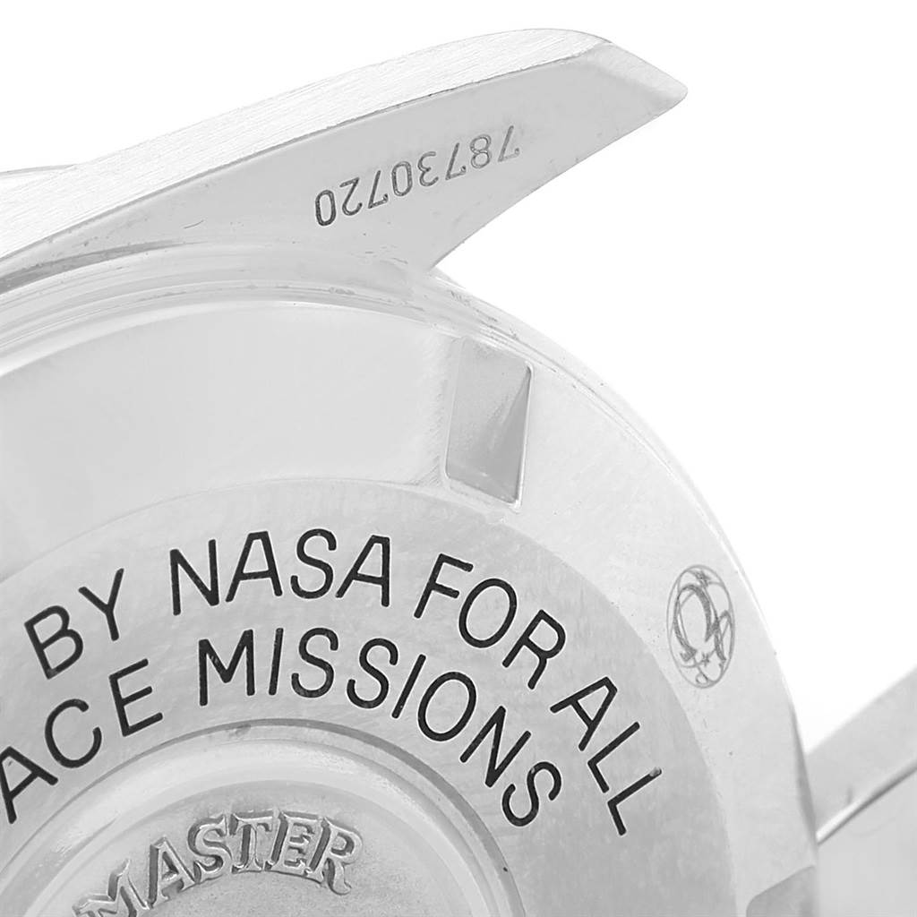 The image shows the case back of an Omega Speedmaster 311.30.42.30.01.005 Men
s Stainless Steel Black Dial 311.30.42.30.01.005 Men
s Stainless Steel Black Dial, highlighting the NASA certification text and part of the watch
s serial number.