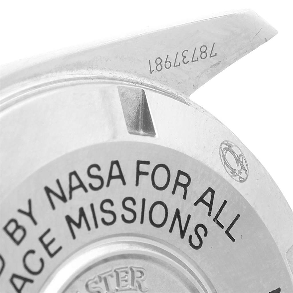 This image shows a close-up of the caseback and part of the lug of an Omega Speedmaster 311.30.42.30.01.005 Men
s Stainless Steel Black Dial 311.30.42.30.01.005 Men
s Stainless Steel Black Dial watch, highlighting the engraved text.