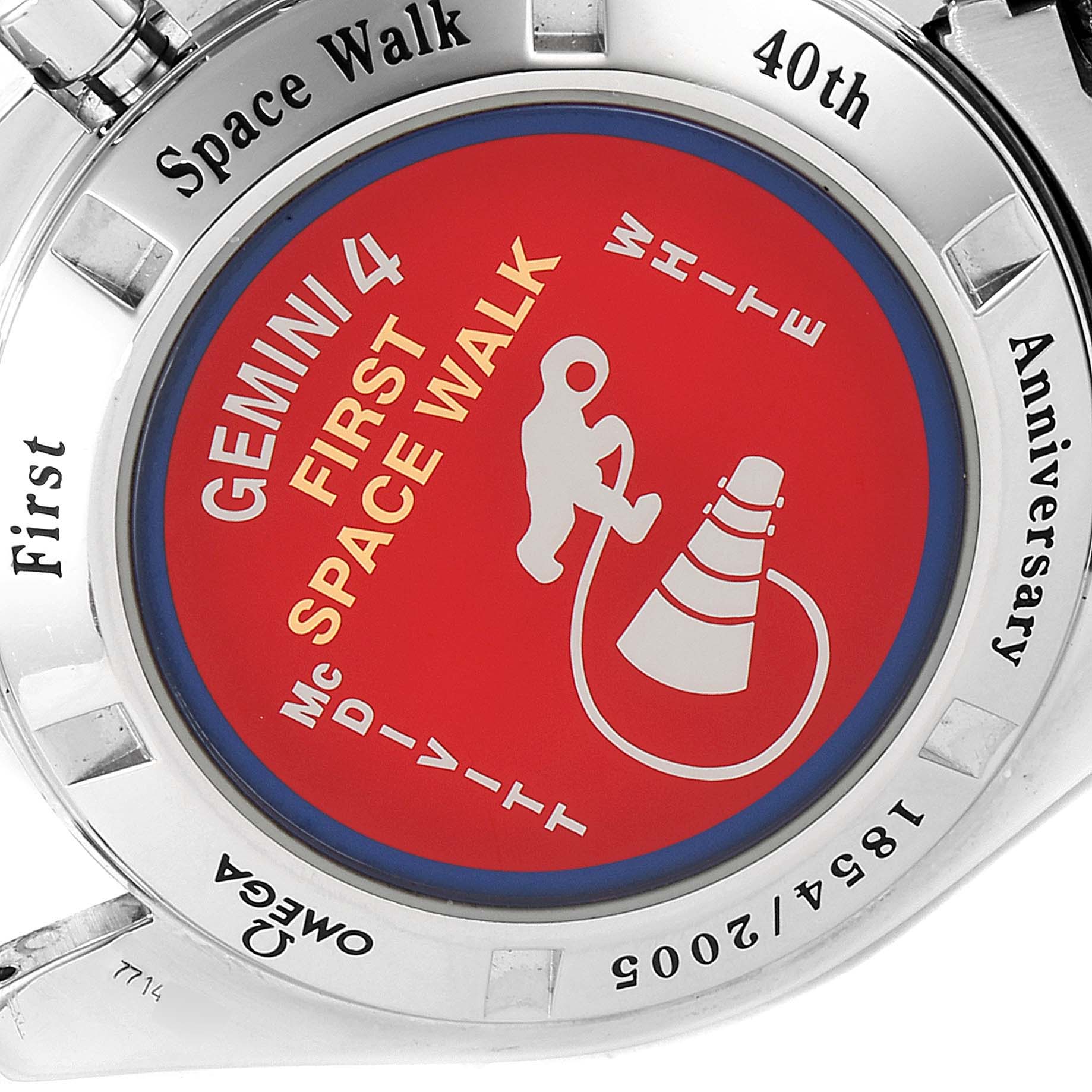 The image shows the case back of an Omega Speedmaster 3565.80.00 Men's Stainless Steel Blue Dial 3565.80.00 Men's Stainless Steel Blue Dial featuring a Gemini 4 First Space Walk 40th Anniversary design.