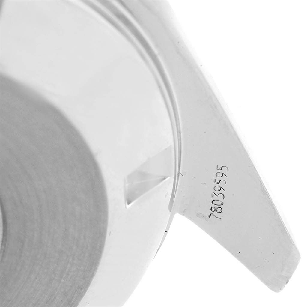 This image shows a close-up angle of the lug and serial number of the Speedmaster model by Omega.