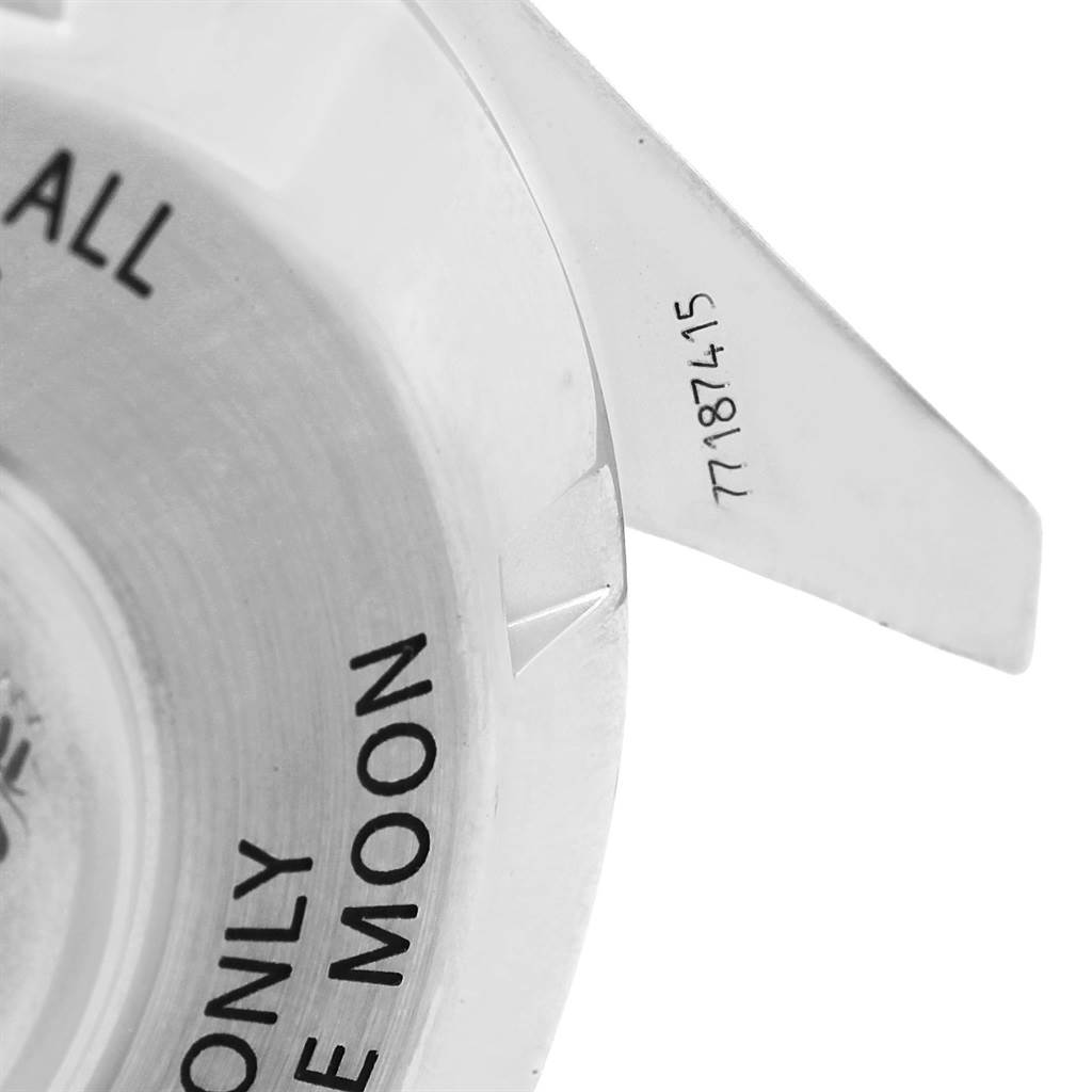 This image shows a close-up of the case back and lug of the Omega Speedmaster 311.30.42.30.01.001 Men
s Stainless Steel Black Dial 311.30.42.30.01.001 Men
s Stainless Steel Black Dial watch.