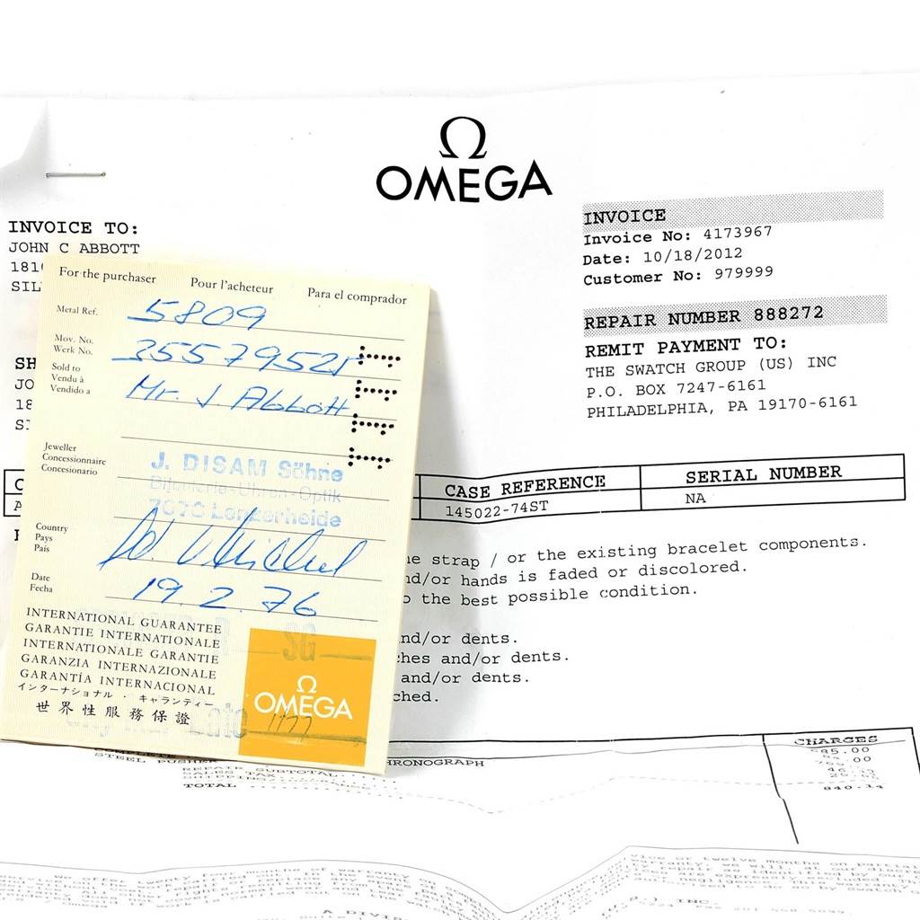 The image shows Omega Speedmaster 145.022 Men
s Stainless Steel Black Dial 145.022 Men
s Stainless Steel Black Dial warranty card and invoice.