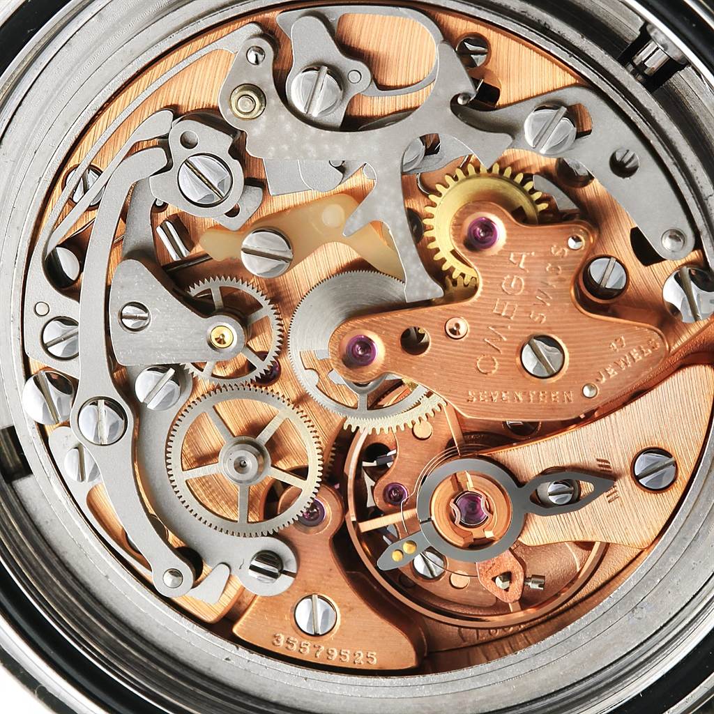 This image shows a close-up view of the Omega Speedmaster 145.022 Men
s Stainless Steel Black Dial 145.022 Men
s Stainless Steel Black Dial
s intricate internal mechanical movement.