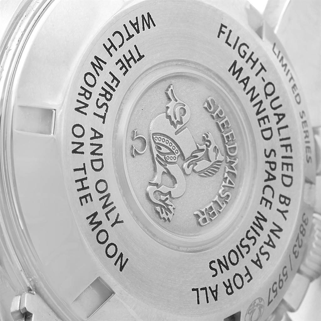 This image shows the case back of the Omega Speedmaster 311.30.42.30.01.001 Men
s Stainless Steel Black Dial 311.30.42.30.01.001 Men
s Stainless Steel Black Dial watch, highlighting engraved text and a logo.