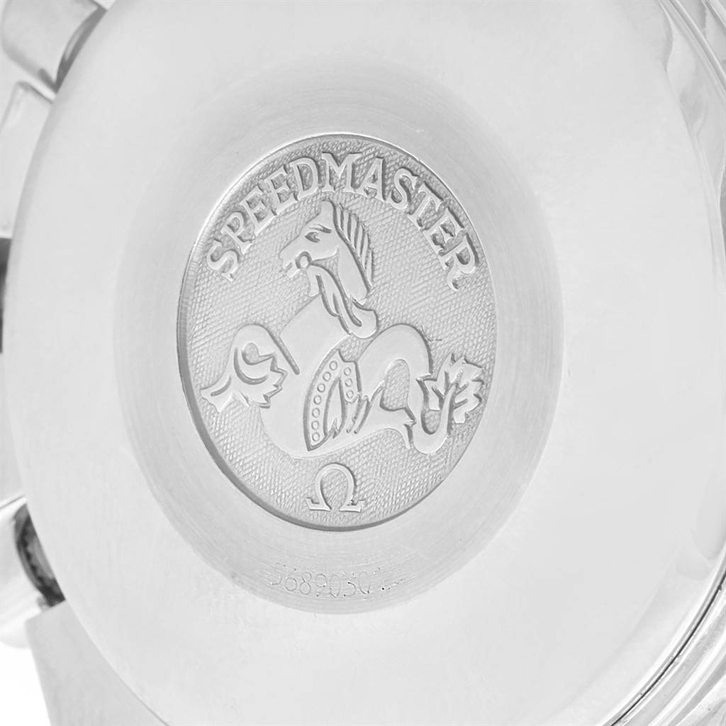 The image shows the case back of an Omega Speedmaster 3523.30.00 Men
s Stainless Steel Silver Dial 3523.30.00 Men
s Stainless Steel Silver Dial watch, featuring its engraved emblem and text.