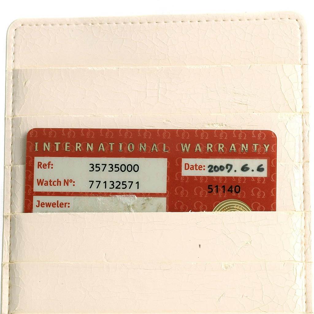 The image shows the international warranty card for an Omega Speedmaster 3573.50.00 Men
s Stainless Steel Black Dial 3573.50.00 Men
s Stainless Steel Black Dial watch with its reference and serial numbers displayed.