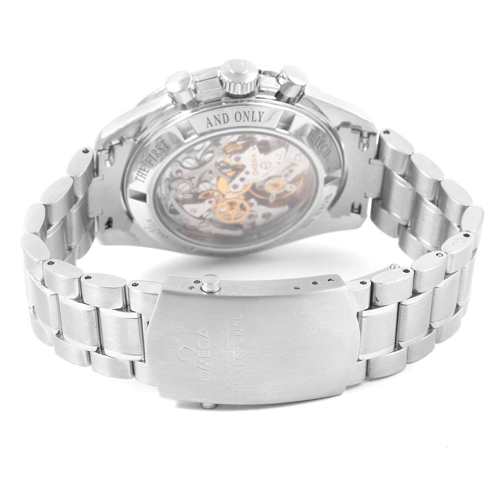 The image shows the back and side view of the Omega Speedmaster 3573.50.00 Men
s Stainless Steel Black Dial 3573.50.00 Men
s Stainless Steel Black Dial watch, including its stainless steel bracelet, clasp, and exposed movement.