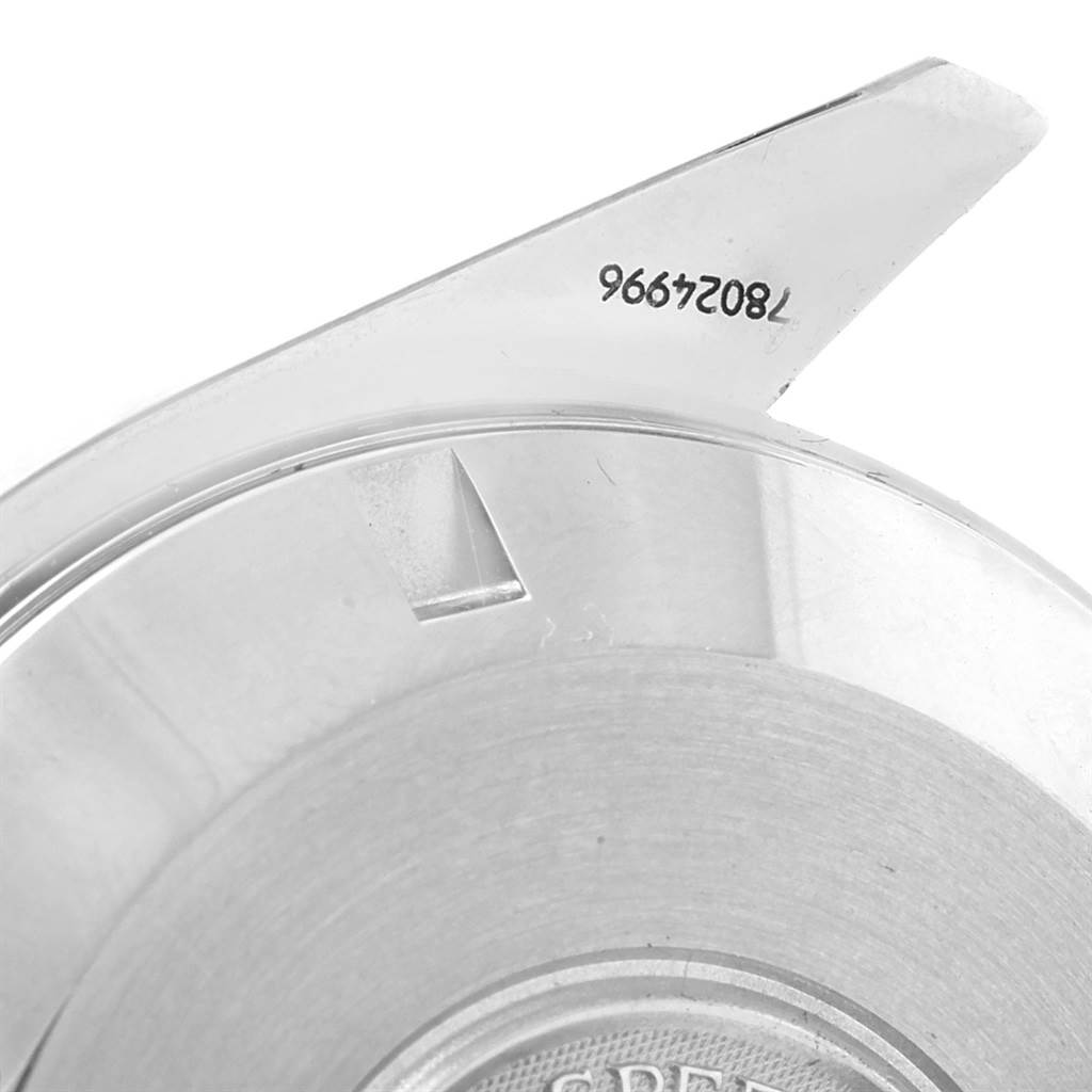 The image shows a close-up of the back case of an Omega Speedmaster 3551.20.00 Men
s Stainless Steel White Dial 3551.20.00 Men
s Stainless Steel White Dial watch, including its serial number.