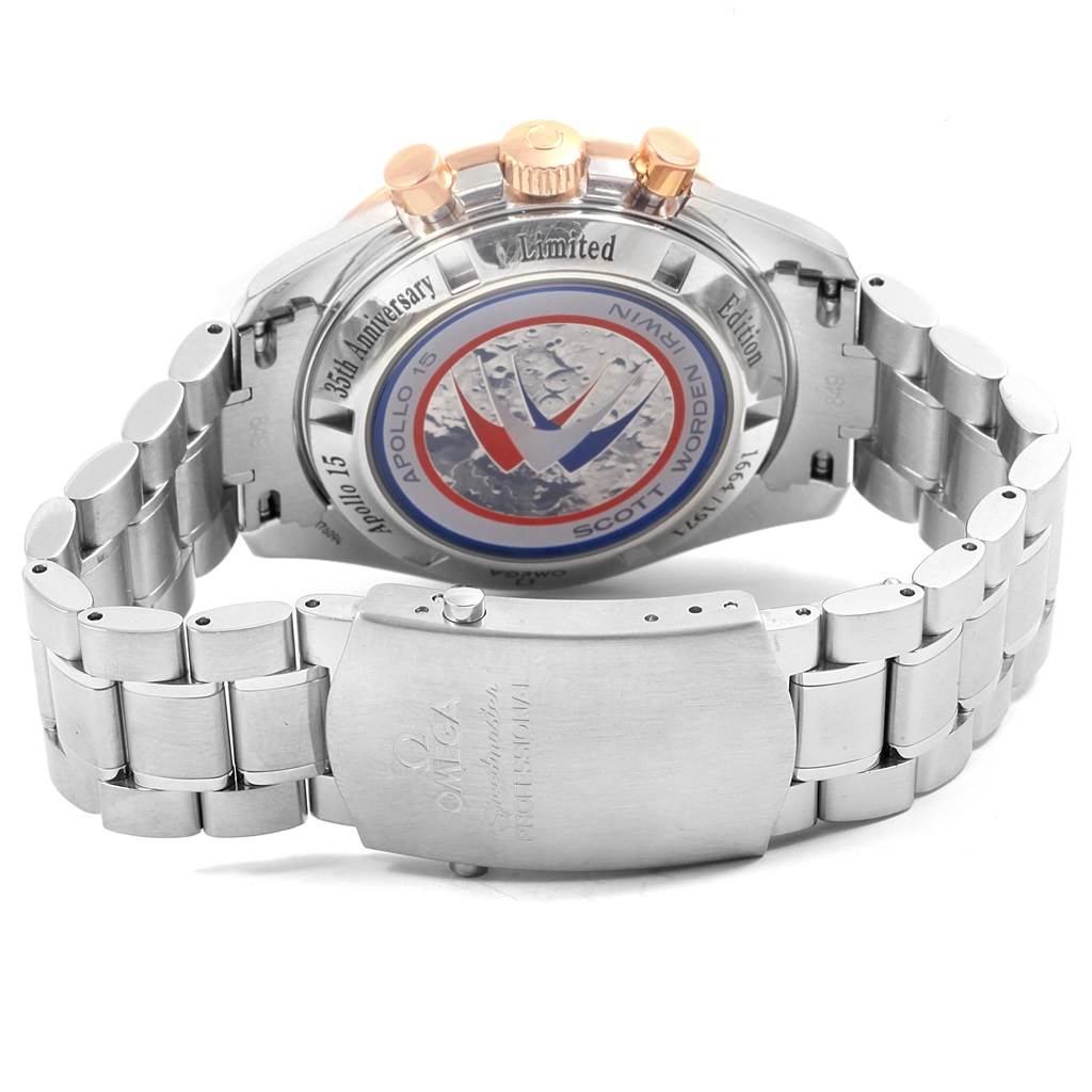 The image shows the back and bracelet of an Omega Speedmaster 3566.51.00 Men's Steel and Gold (two tone) Black Dial 3566.51.00 Men's Steel and Gold (two tone) Black Dial, highlighting the commemorative case back and clasp.