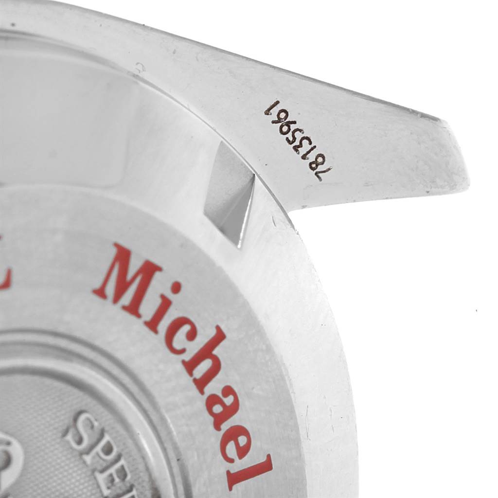 The image shows a close-up of the back case and engraved lugs of an Omega Speedmaster 3506.31.00 Men's Stainless Steel Silver Dial 3506.31.00 Men's Stainless Steel Silver Dial watch.