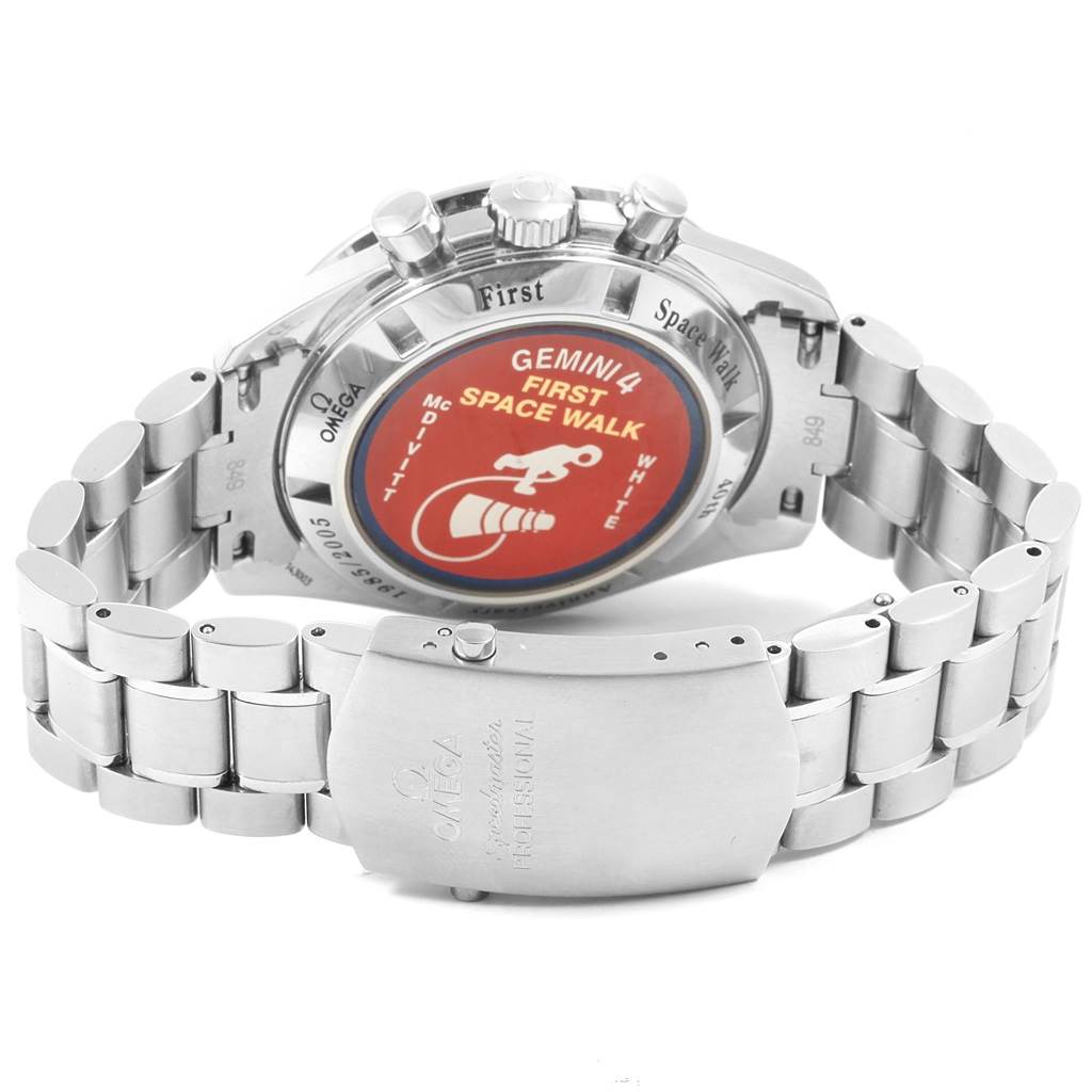 This image shows the back view and bracelet of an Omega Speedmaster 3565.80.00 Men's Stainless Steel Blue Dial 3565.80.00 Men's Stainless Steel Blue Dial watch, highlighting the Gemini 4 First Space Walk inscription.