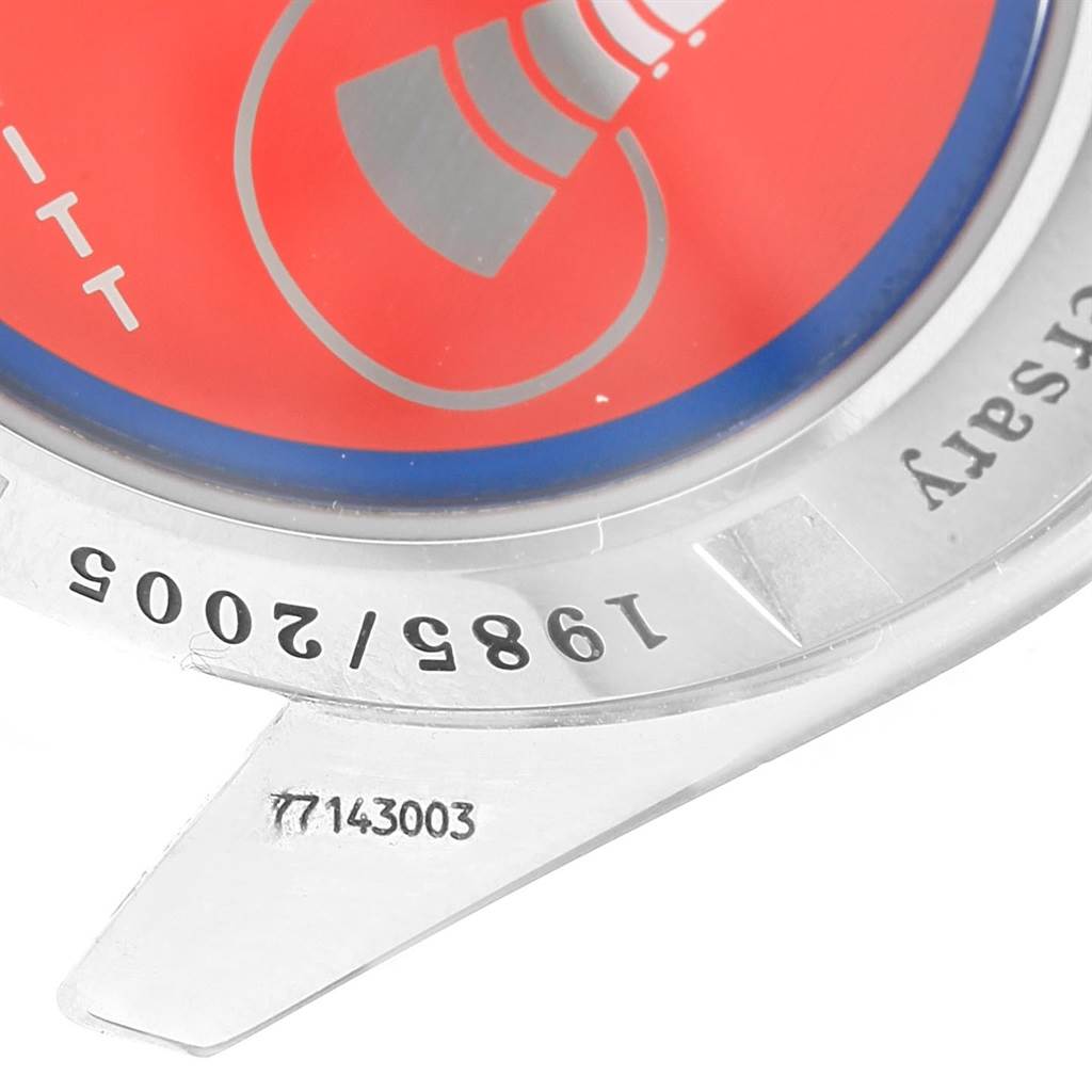 The image shows a close-up of the case back of an Omega Speedmaster 3565.80.00 Men's Stainless Steel Blue Dial 3565.80.00 Men's Stainless Steel Blue Dial, highlighting an anniversary edition engraving and partial decoration.