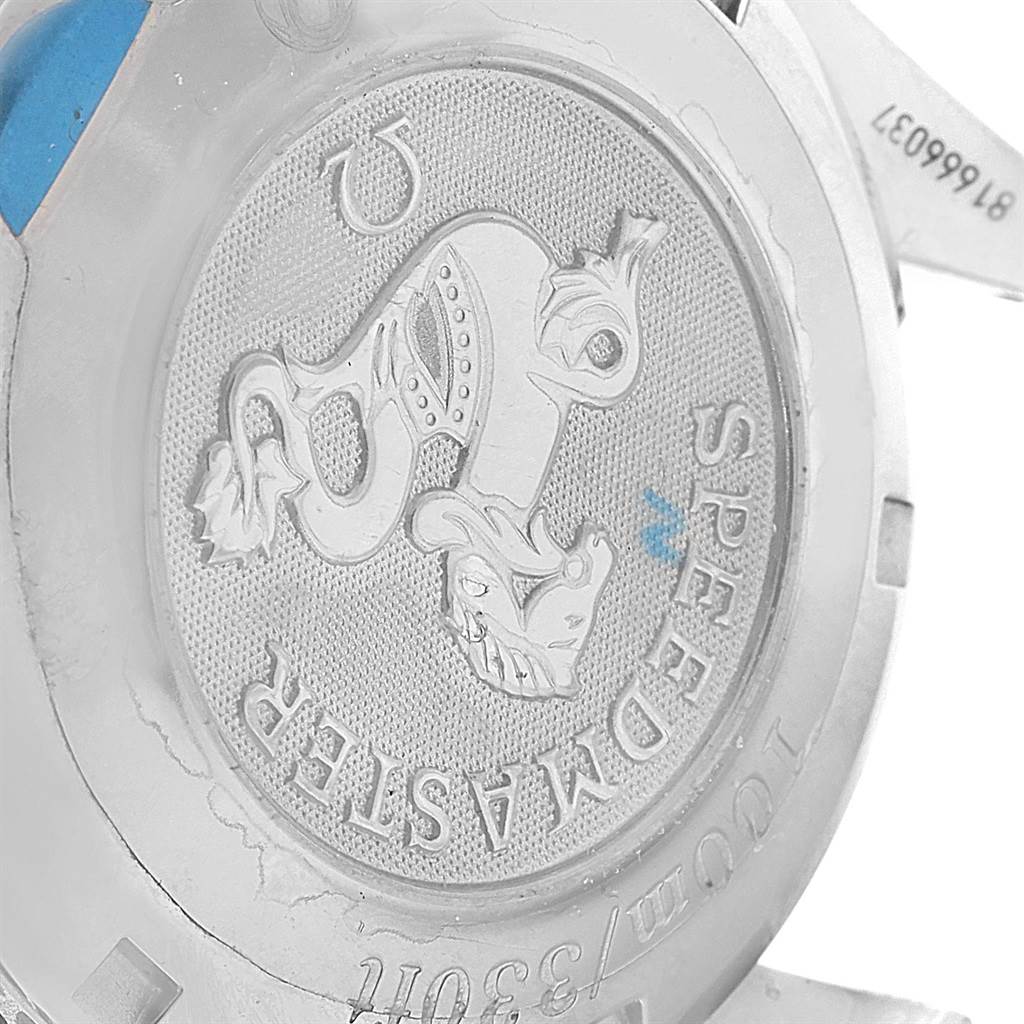 The image shows the case back of an Omega Speedmaster 3220.50.00 Men
s Stainless Steel Black Dial 3220.50.00 Men
s Stainless Steel Black Dial watch, highlighting the engraved logo and text details.