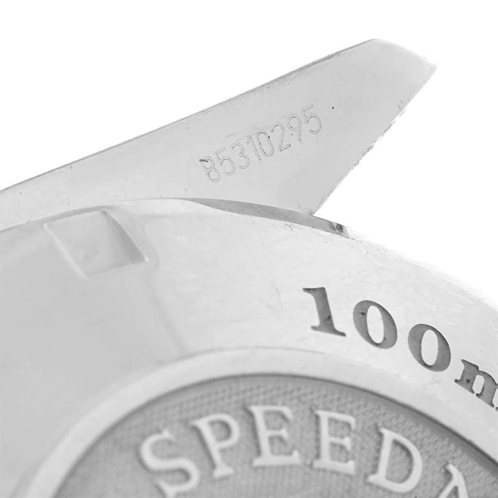 This image shows a close-up of the back casing and serial number of the Omega Speedmaster 323.30.40.40.04.001 Men's Stainless Steel White Dial 323.30.40.40.04.001 Men's Stainless Steel White Dial watch.