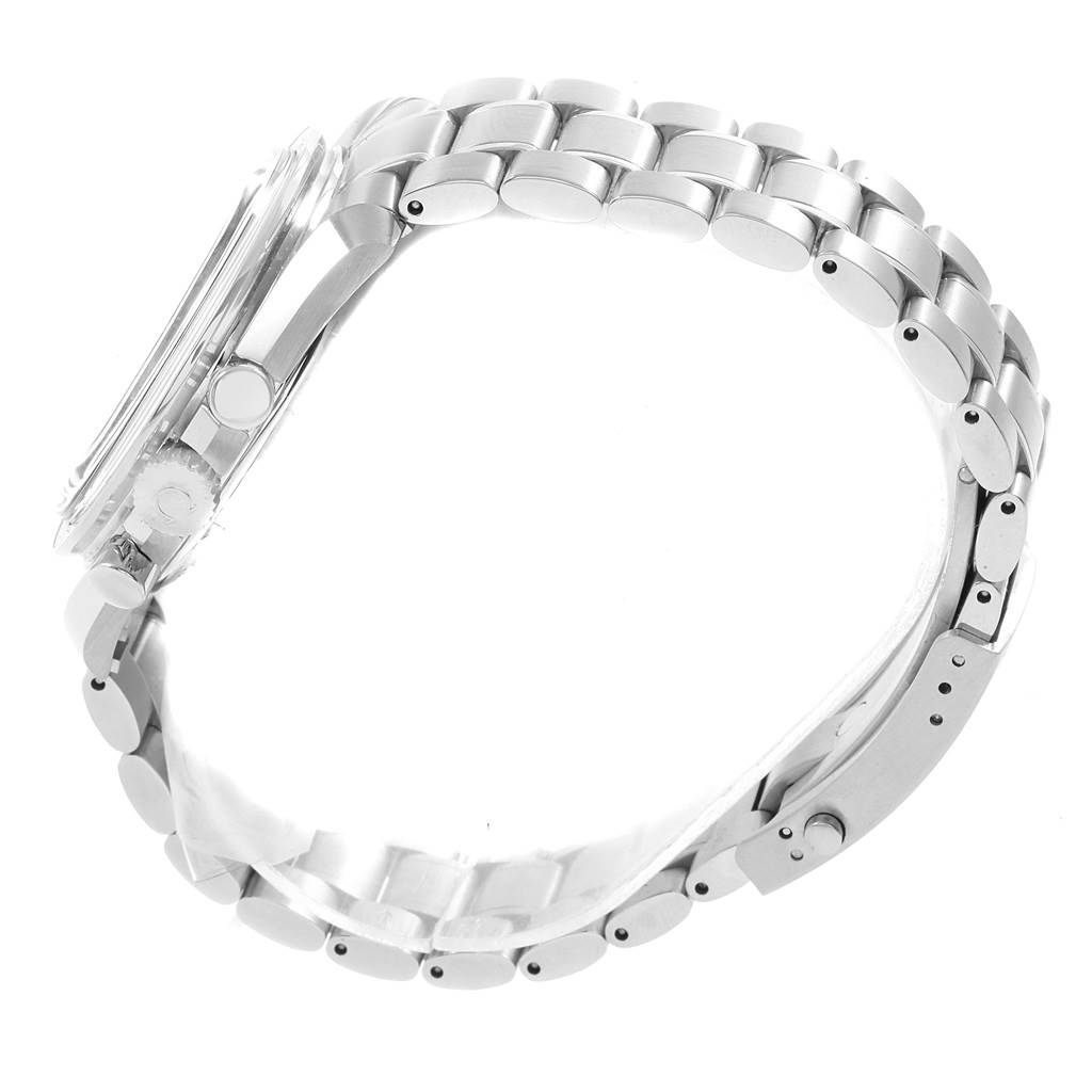 The image shows the side profile of an Omega Speedmaster 3577.50.00 Men's Stainless Steel Black Dial 3577.50.00 Men's Stainless Steel Black Dial watch, highlighting its case, crown, pushers, and stainless steel bracelet.