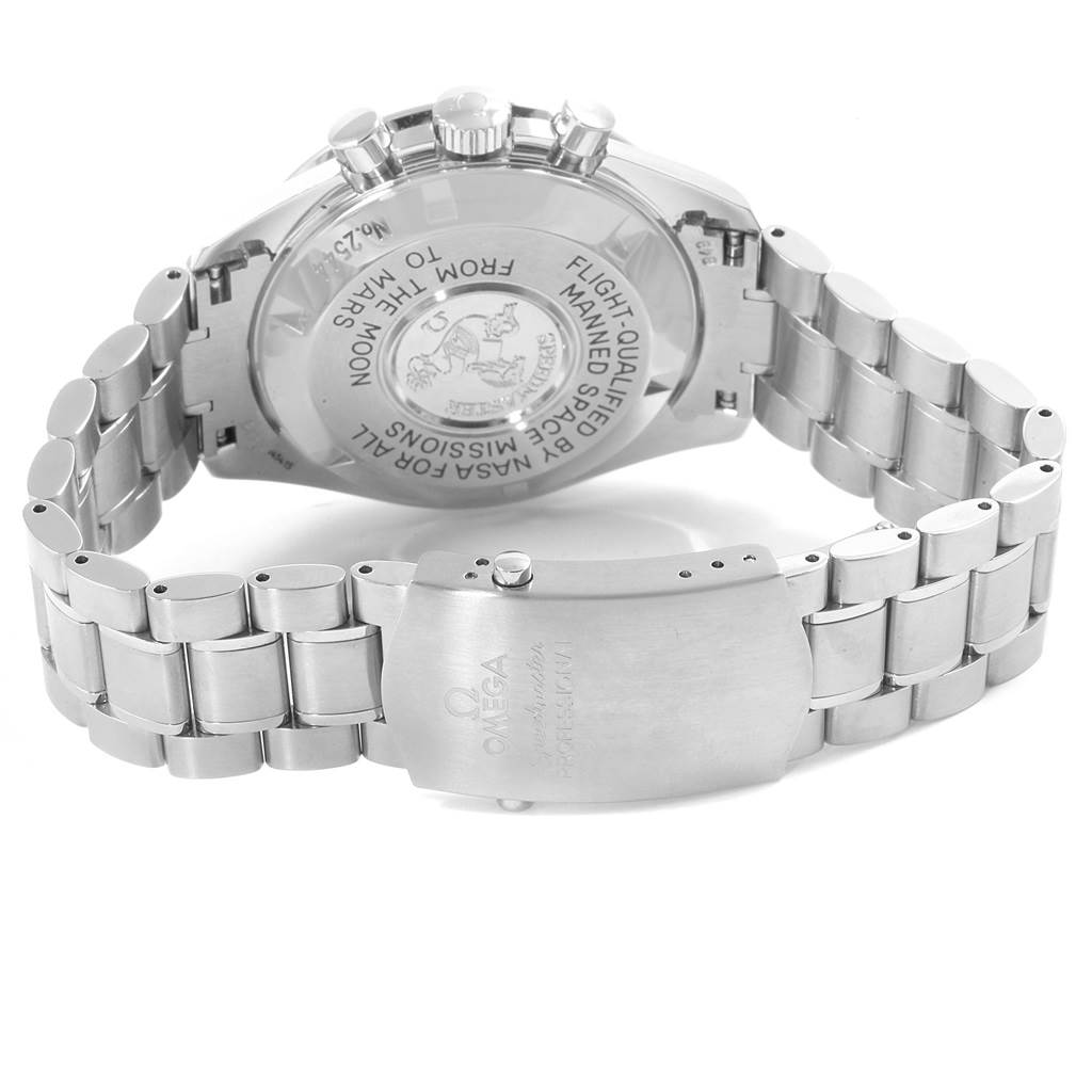 The image shows the back case and bracelet of an Omega Speedmaster 3577.50.00 Men's Stainless Steel Black Dial 3577.50.00 Men's Stainless Steel Black Dial watch, highlighting its engraved details and clasp.