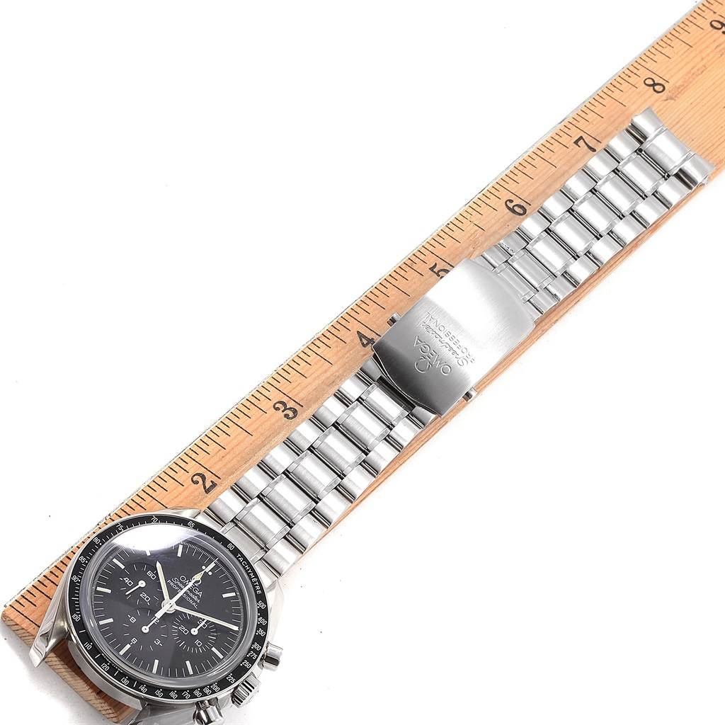 The image shows an overhead view of the Omega Speedmaster 3573.50.00 Men
s Stainless Steel Black Dial 3573.50.00 Men
s Stainless Steel Black Dial watch, highlighting its face, stainless steel bracelet, and clasp.