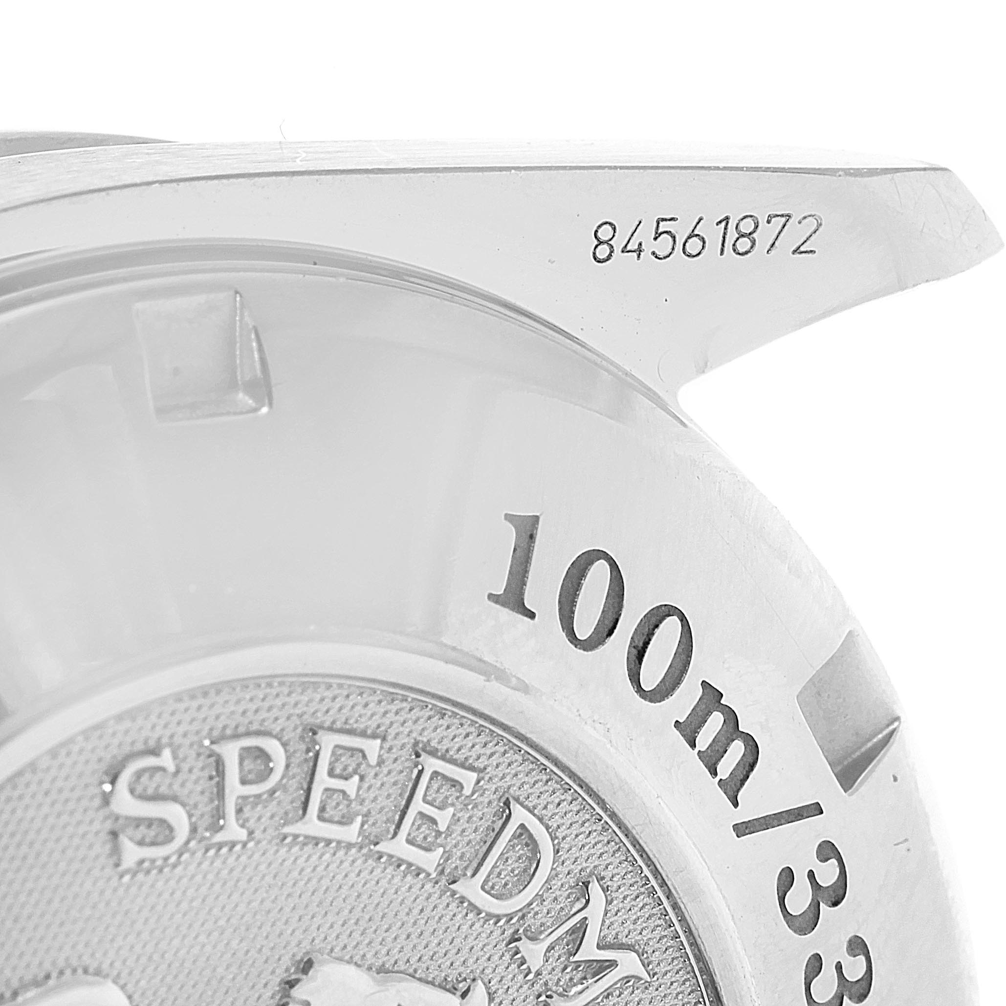 The image shows a close-up of the case back of an Omega Speedmaster 3210.50.00 Men
s Stainless Steel Black Dial 3210.50.00 Men
s Stainless Steel Black Dial watch, highlighting the water resistance and part of the serial number.