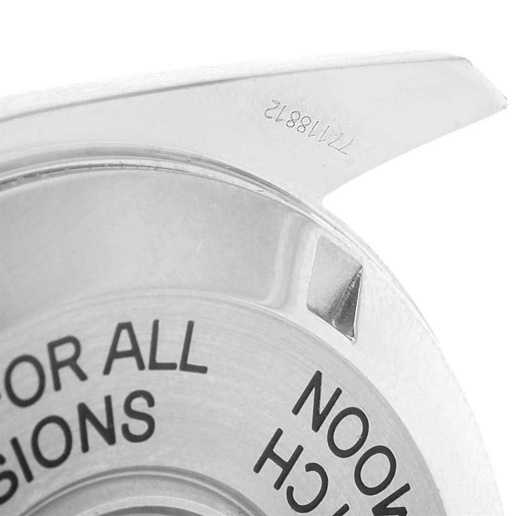 This image shows a close-up of the case back and a lug of an Omega Speedmaster 3575.20.00 Men
s Stainless Steel White Dial 3575.20.00 Men
s Stainless Steel White Dial watch.