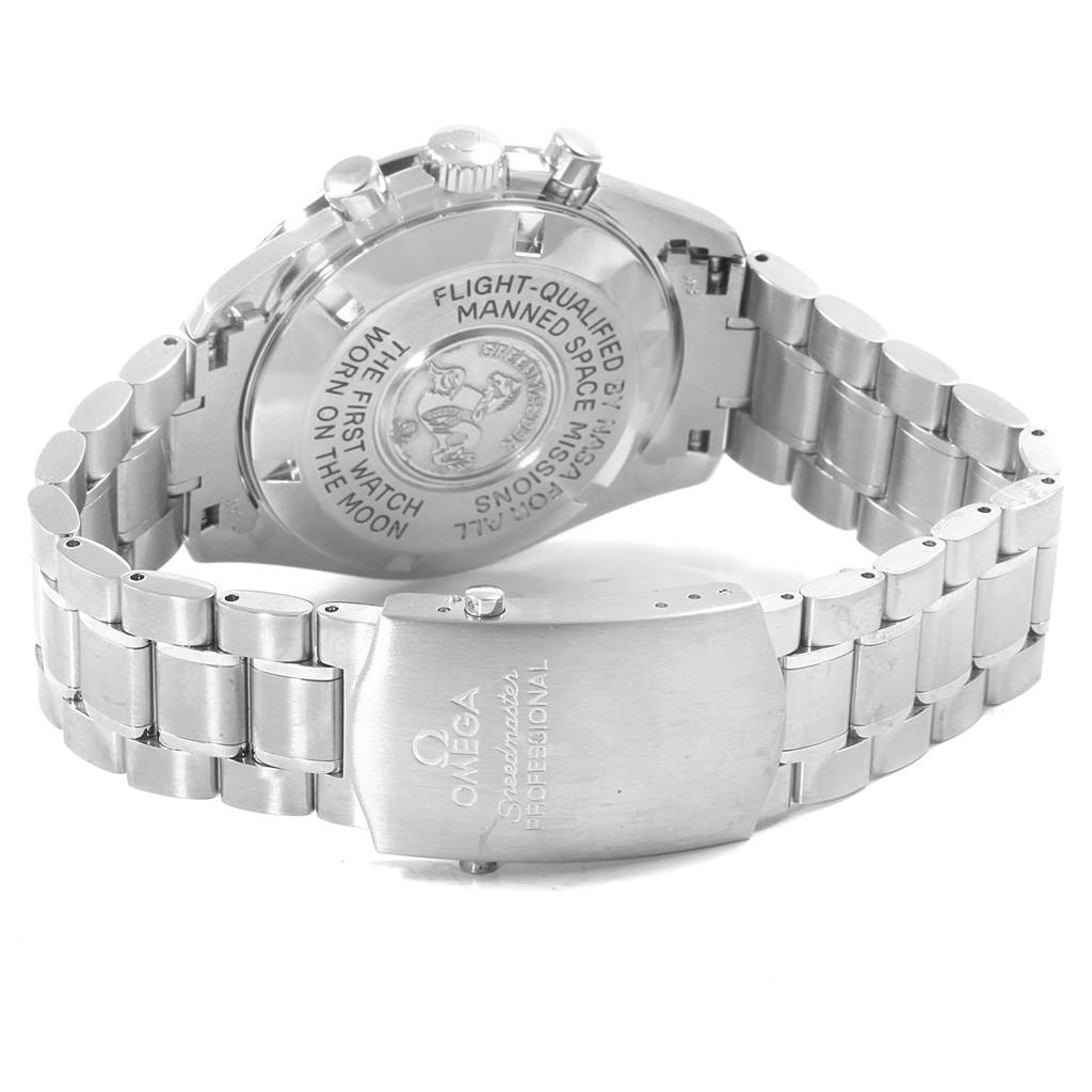 The image shows the back case, clasp, and part of the metal bracelet of the Omega Speedmaster 3570.50.00 Men
s Stainless Steel Black Dial 3570.50.00 Men
s Stainless Steel Black Dial watch.