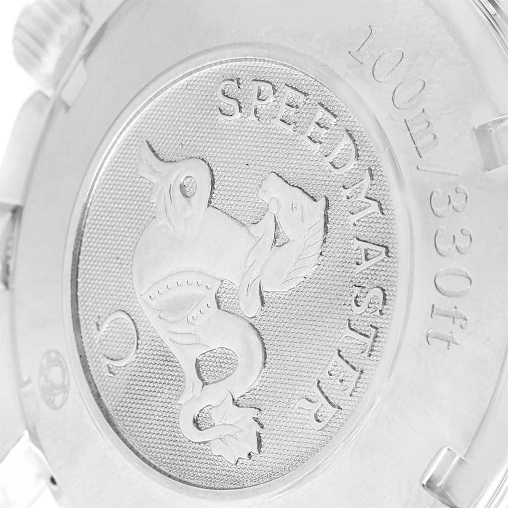 This image shows the case back of the Omega Speedmaster 3220.50.00 Men
s Stainless Steel Black Dial 3220.50.00 Men
s Stainless Steel Black Dial watch, featuring engraved text and emblem.