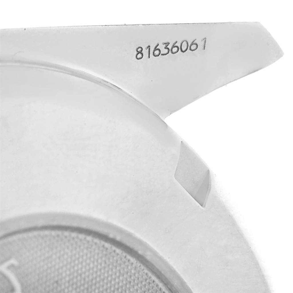 This image shows a close-up angle of the casing and serial number of an Omega Speedmaster 3220.50.00 Men
s Stainless Steel Black Dial 3220.50.00 Men
s Stainless Steel Black Dial watch.