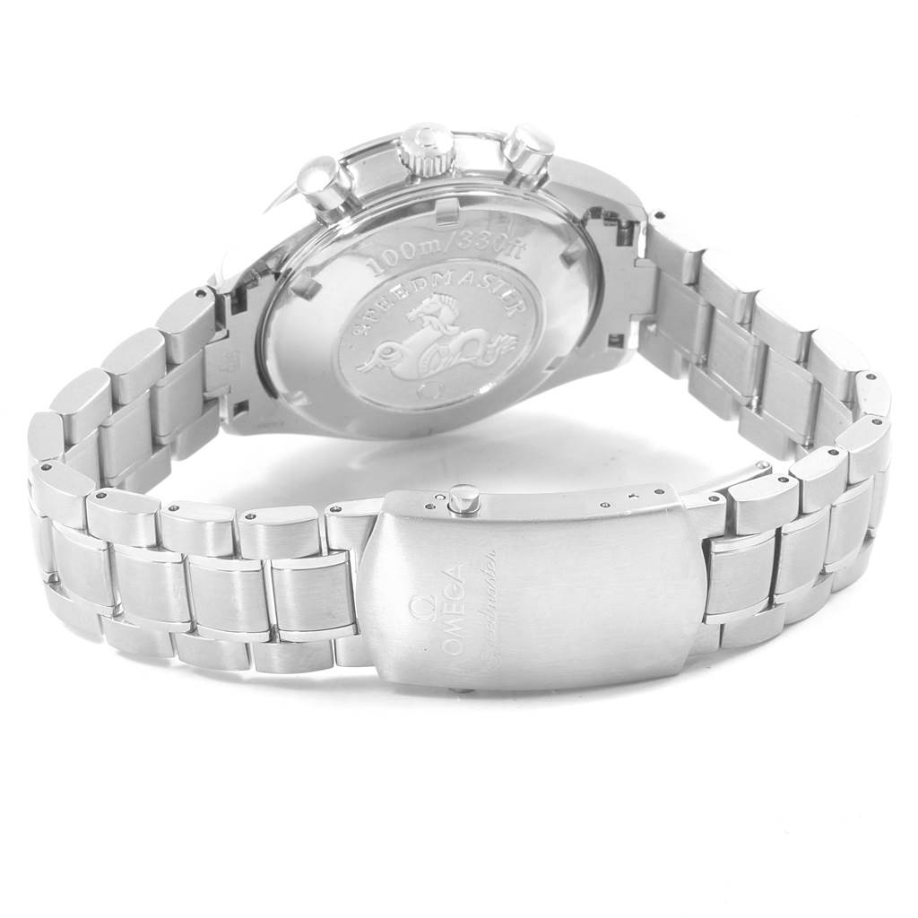 The image shows the backside and bracelet of an Omega Speedmaster 3220.50.00 Men
s Stainless Steel Black Dial 3220.50.00 Men
s Stainless Steel Black Dial watch with the watch case back and clasp visible.