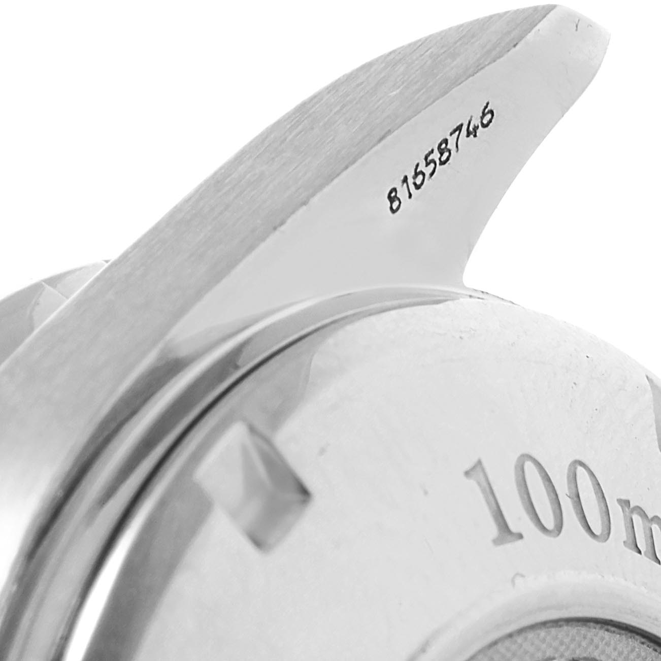 The image shows a close-up of the case back and part of the lugs of an Omega Speedmaster 3211.30.00 Men
s Stainless Steel Silver Dial 3211.30.00 Men
s Stainless Steel Silver Dial watch, with the serial number visible.