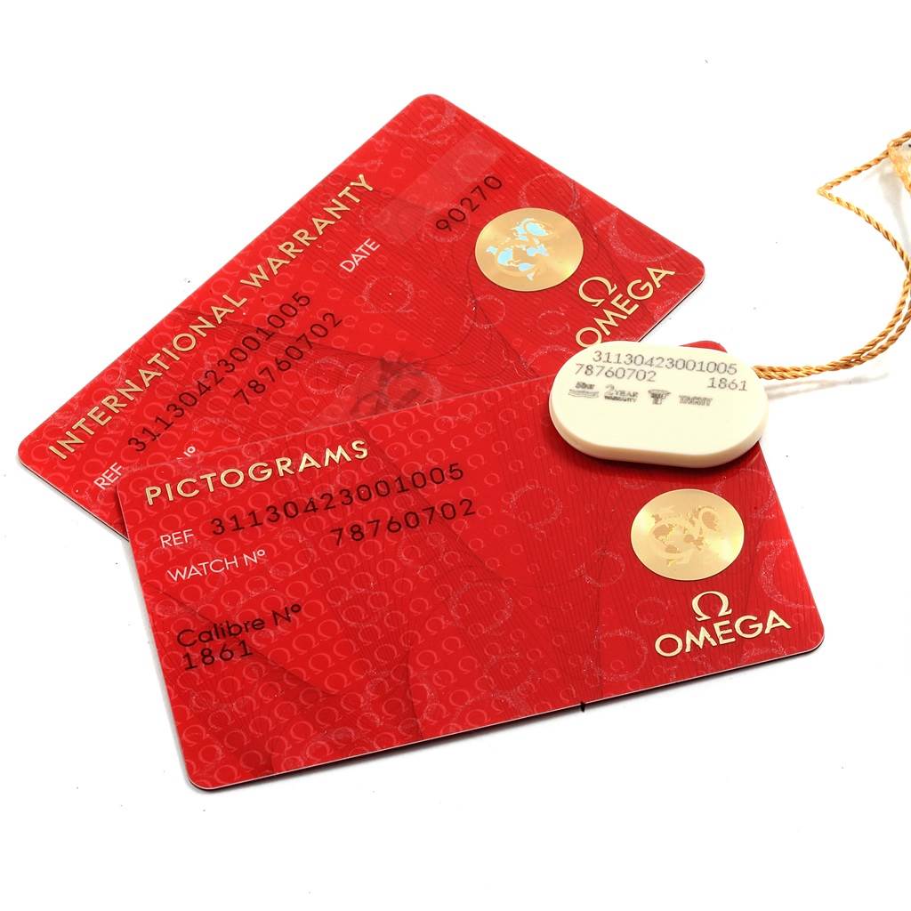 The image shows the warranty card, pictogram card, and tag for the Omega Speedmaster 311.30.42.30.01.005 Men
s Stainless Steel Black Dial 311.30.42.30.01.005 Men
s Stainless Steel Black Dial watch.