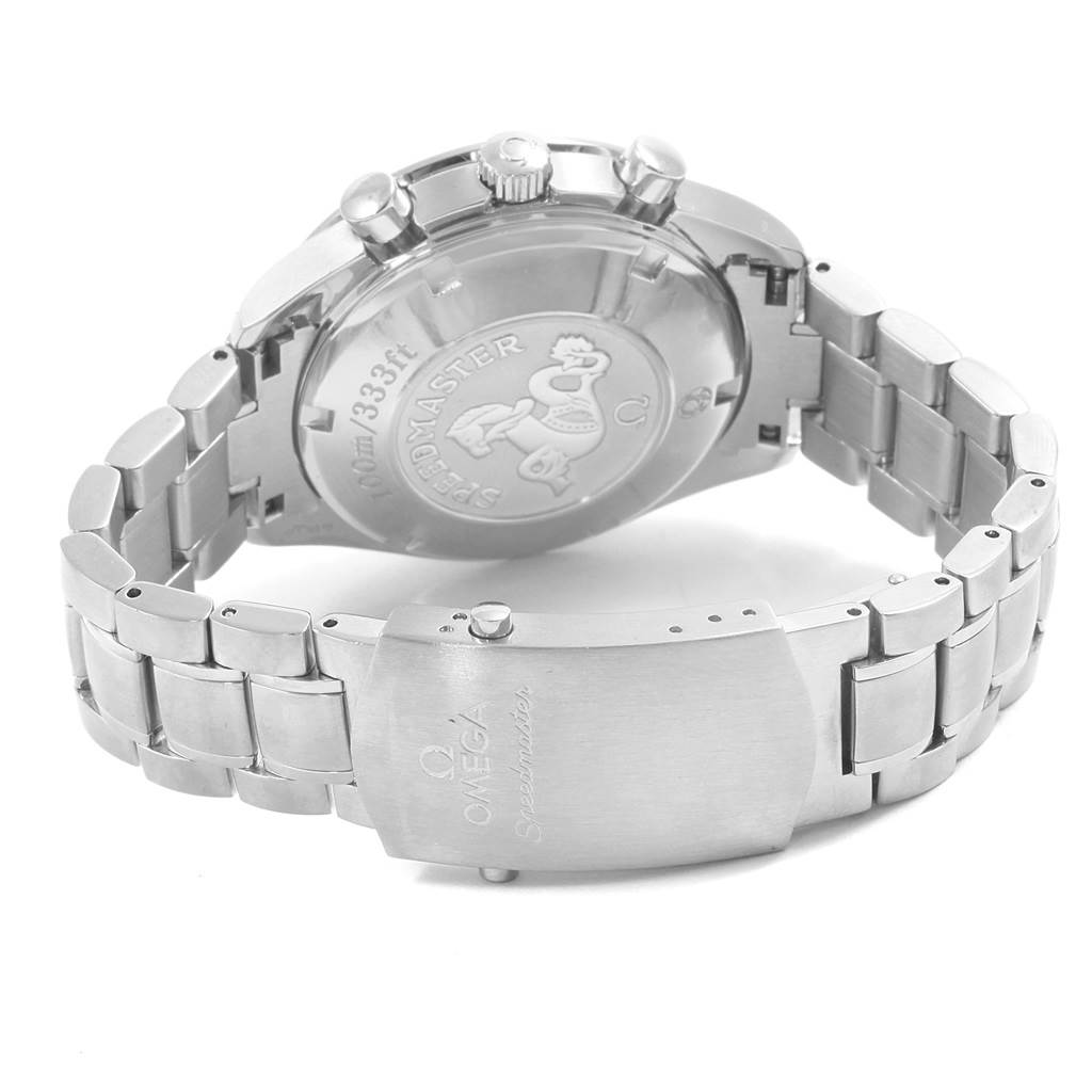 The image shows the back case and bracelet of an Omega Speedmaster 3212.80.00 Men
s Stainless Steel Blue Dial 3212.80.00 Men
s Stainless Steel Blue Dial watch, with focus on the clasp and back markings.