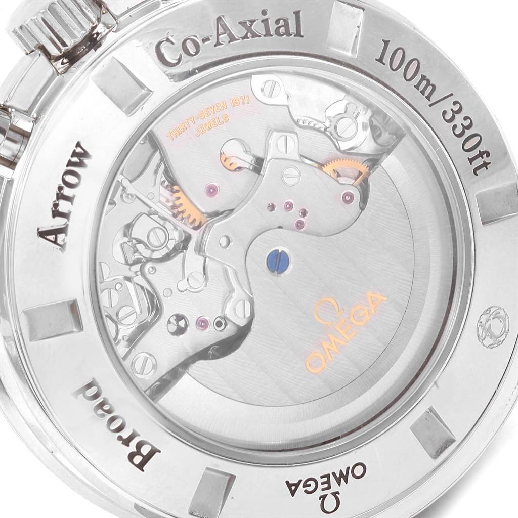 The image shows the backside view of the Omega Speedmaster 321.13.44.50.02.001 Men
s Stainless Steel Silver Dial 321.13.44.50.02.001 Men
s Stainless Steel Silver Dial watch, highlighting its co-axial movement and internal mechanics.