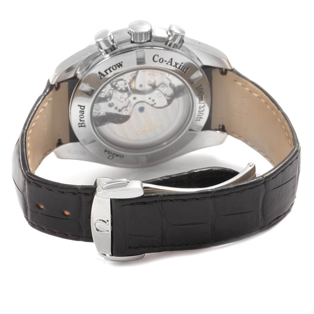 The image shows the back view of an Omega Speedmaster 321.13.44.50.02.001 Men
s Stainless Steel Silver Dial 321.13.44.50.02.001 Men
s Stainless Steel Silver Dial watch, highlighting the transparent case back and leather strap with a clasp.