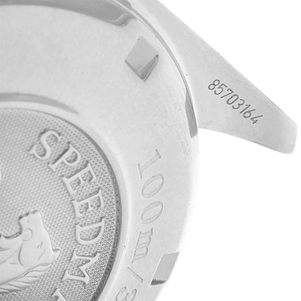 The image shows the engraved case back of an Omega Speedmaster 3210.50.00 Men
s Stainless Steel Black Dial 3210.50.00 Men
s Stainless Steel Black Dial watch, highlighting the water resistance rating and serial number.