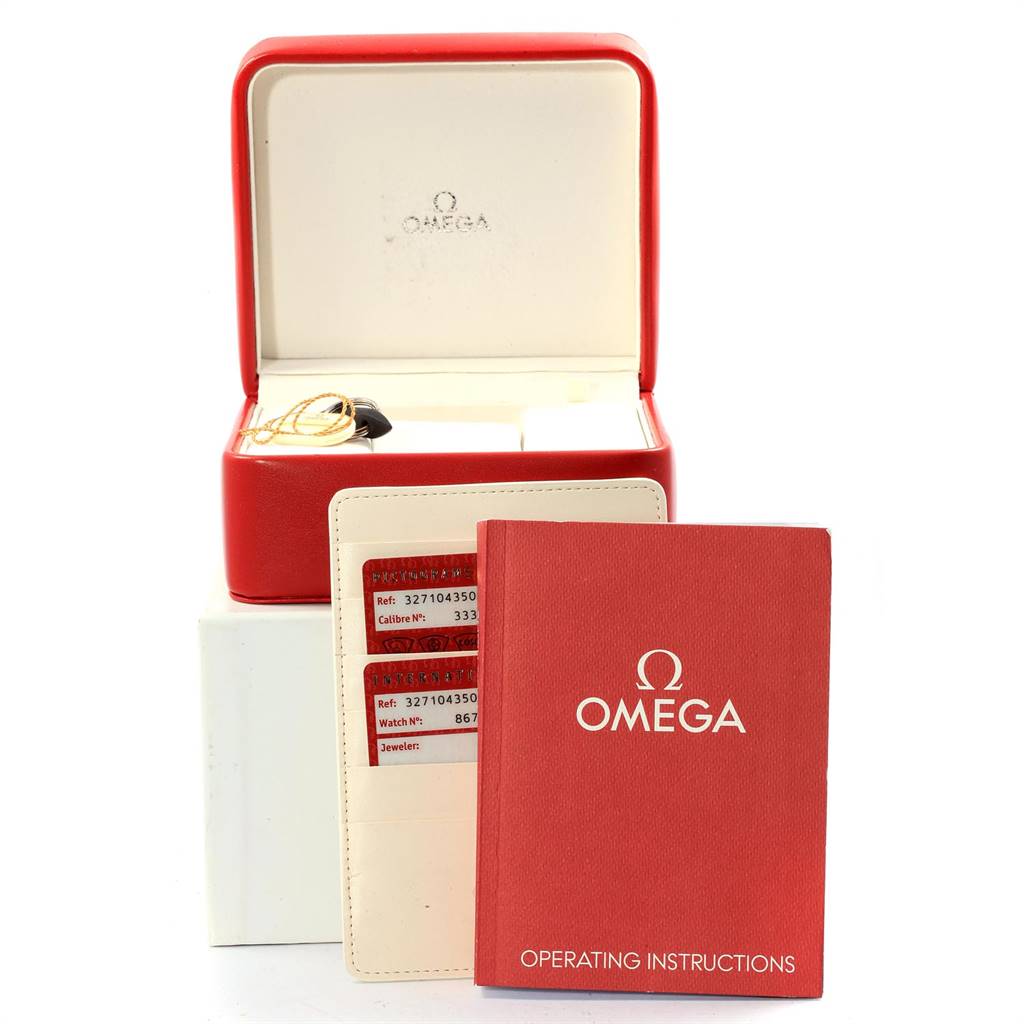 This image shows an Omega Speedmaster 327.10.43.50.06.001 Men
s Stainless Steel Grey Dial 327.10.43.50.06.001 Men
s Stainless Steel Grey Dial watch box, operating instructions, and warranty cards.