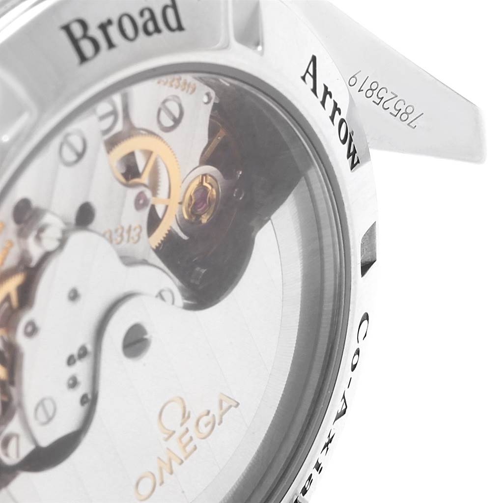 The image shows a close-up view of the back of an Omega Speedmaster 321.10.42.50.01.001 Men
s Stainless Steel Black Dial 321.10.42.50.01.001 Men
s Stainless Steel Black Dial, highlighting the movement and part of the case with engraving.