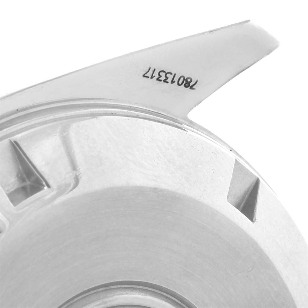 This image shows a close-up of the lug and part of the back case of an Omega Speedmaster 3551.50.00 Men
s Stainless Steel Black Dial 3551.50.00 Men
s Stainless Steel Black Dial watch, with a visible reference number.