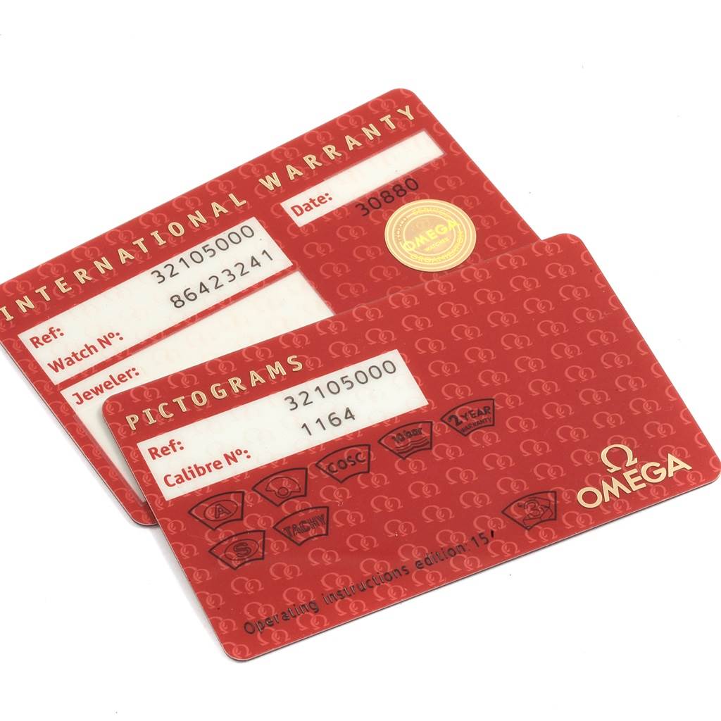 The image shows two red Omega Speedmaster 3210.50.00 Men
s Stainless Steel Black Dial 3210.50.00 Men
s Stainless Steel Black Dial cards: an international warranty card and a pictograms card, slightly overlapping.