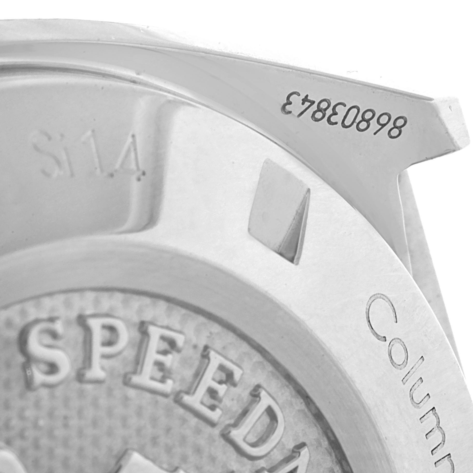 The image shows a close-up view of the rear engraving on an Omega Speedmaster 327.10.43.50.06.001 Men
s Stainless Steel Grey Dial 327.10.43.50.06.001 Men
s Stainless Steel Grey Dial watch, including the model name and serial number.