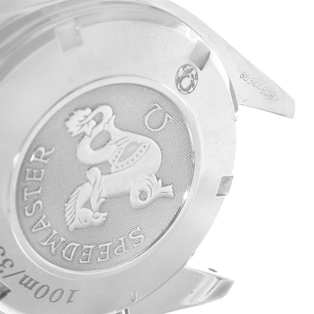 The image shows the back case of an Omega Speedmaster 3210.50.00 Men
s Stainless Steel Black Dial 3210.50.00 Men
s Stainless Steel Black Dial watch, featuring an embossed design and text.