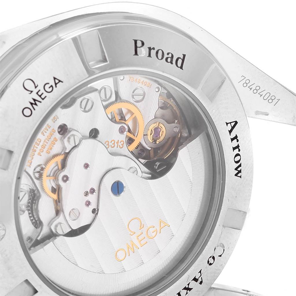 The image shows the inner mechanism and detailed parts of the Omega Speedmaster 321.10.44.50.02.001 Men
s Stainless Steel Silver Dial 321.10.44.50.02.001 Men
s Stainless Steel Silver Dial Broad Arrow watch from a close-up, angled view.