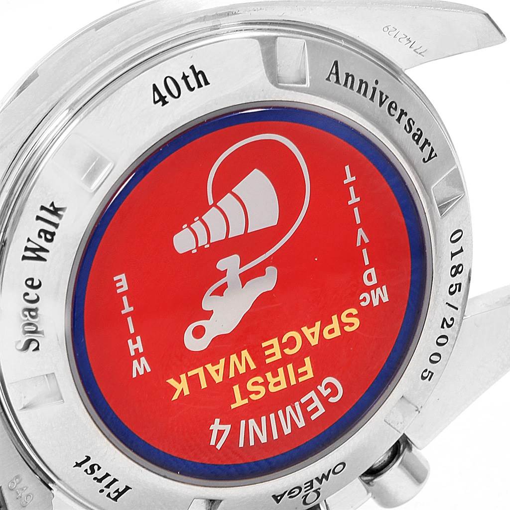 This image shows the back case of the Omega Speedmaster 3565.80.00 Men
s Stainless Steel Blue Dial 3565.80.00 Men
s Stainless Steel Blue Dial watch, featuring a commemorative design for the 40th Anniversary of the first spacewalk.