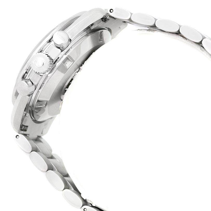 The image shows a side view of an Omega Speedmaster 3594.50.00 Men
s Stainless Steel Black Dial 3594.50.00 Men
s Stainless Steel Black Dial watch, focusing on the case, crown, pushers, and part of the metal bracelet.