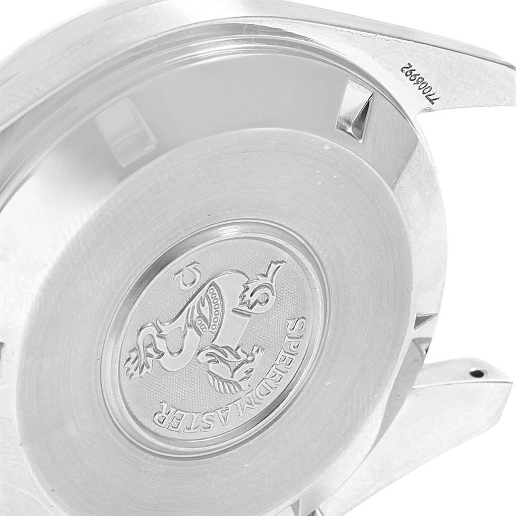 This image shows the rear case back and lugs of an Omega Speedmaster 3594.50.00 Men
s Stainless Steel Black Dial 3594.50.00 Men
s Stainless Steel Black Dial watch, highlighting its engraved emblem.